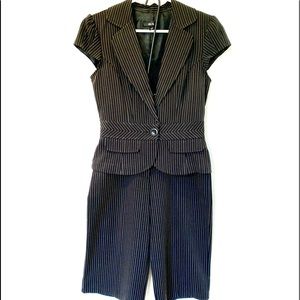 Teens semi formal pant suits, black background with white and beige stripes.
